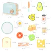 A collection of wooden toy food items and a toaster, with dimensions indicated by measurement lines and numbers. Anteprima dell’immagine prodotto