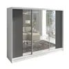 A modern sliding door wardrobe with mirrored doors, reflecting a living room interior.