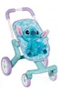 A Stitch doll is placed in a toy stroller. Náhľad obrázku produktu