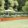 A wooden planter box filled with blue hydrangeas in a garden setting, with a large white umbrella in the background. Produktbild-Vorschau