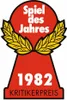 A red keyhole-shaped graphic with gold laurel leaves and white text indicating "Spiel des Jahres 1982 Kritikerpreis". Podgląd zdjęcia produktu