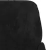 A close-up view of a black velvet armchair, showing a tufted button detail. Náhľad obrázku produktu