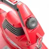 Close-up of a red leaf blower with a black adjustment knob. Produktbild-Vorschau