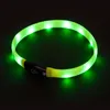A glowing green LED dog collar on a black background. Anteprima dell’immagine prodotto