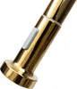 A close-up shot of a gold-colored faucet handle with a light gray button. Podgląd zdjęcia produktu