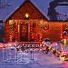 A log cabin decorated with Christmas lights and snow. Podgląd zdjęcia produktu