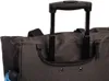 A close-up view of the top of a wheeled bag, focusing on the retractable handle and the fabric. Náhľad obrázku produktu
