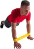 A man is doing a push-up exercise with resistance bands around his wrists. Produktbild-Vorschau