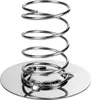 A stainless steel ham cooker stand with a coiled spring design and a circular base, presented against a white background. Podgląd zdjęcia produktu