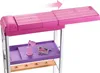 A close-up view of a toy vanity or dressing table with accessories. Podgląd zdjęcia produktu