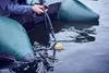 A person in a boat is using a Deeper Sonar Chirp+ 2 fish finder in the water. Voir les images du produit