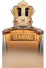 A perfume bottle with a crown-shaped cap. Anteprima dell’immagine prodotto