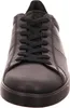 A close-up, front-facing view of a black leather sneaker. Voir les images du produit