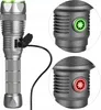 A flashlight with a USB charging port and close-ups of its power button showing green and red indicator lights. Produktbild-Vorschau