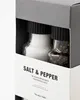 A close-up view of a Nicolas Vahé gift box containing salt and pepper grinders. Produktbild-Vorschau