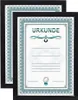Two framed certificates are shown, one slightly behind the other. Produktbild-Vorschau