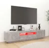 A modern TV stand with LED lighting in a living room setting. Náhľad obrázku produktu