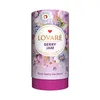 A cylindrical tea container with a floral design. Anteprima dell’immagine prodotto