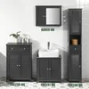 Bathroom vanity units and a storage cabinet against a tiled wall. Náhled obrázku produktu