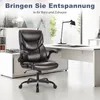 A brown leather office chair is shown in a modern office setting with a desk and window. Produktbild-Vorschau