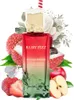 A perfume bottle is surrounded by fruits and flowers, with a decorative cap resembling a drink. Voir les images du produit