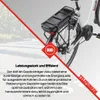 A close-up of the rear of an electric bicycle, focusing on the battery pack mounted on the rack. Produktbild-Vorschau