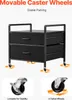 A black fabric drawer unit with a metal frame, shown with caster wheels. The top of the unit has text overlays. Podgląd zdjęcia produktu