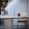 A modern office or study room with a desk, laptop, and a floor lamp. Produktbild-Vorschau