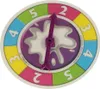 A close-up, top-down view of a Pie Face game spinner. Podgląd zdjęcia produktu