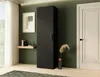 A black tall cabinet is placed in a room with green walls, a white door, and a window with white curtains. Produktbild-Vorschau