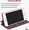 A pink flip case for a smartphone is shown open, with the phone inside, demonstrating its stand-up feature. Text describes the stand-up function. Produktbild-Vorschau