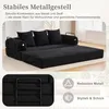 A black sofa bed is shown in a room, with text overlays highlighting its features. Produktbild-Vorschau