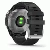 The back of a black Garmin Fenix 6 multisport watch with a green heart rate sensor. Produktbild-Vorschau