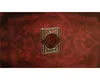 A deck of Bicycle Vintage playing cards is centered on a blurred red patterned background. Produktbild-Vorschau