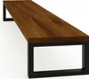 A monitor stand with a dark brown wooden top and black metal legs, shown from a side angle against a white background. Podgląd zdjęcia produktu