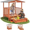 Two children playing in a wooden sandbox with a covered veranda. Produktbild-Vorschau