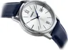 A close-up shot of a silver Casio watch with a blue leather strap, angled on a white background. Voir les images du produit