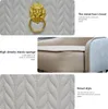 A collage of images showcasing details of a chair, including a lion's head embellishment, the seat cushion, and the textured back. Podgląd zdjęcia produktu