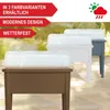 Three raised garden beds with clear lids are shown on a wooden deck, with a blurred background of greenery and a sunny sky with rain clouds. Produktbild-Vorschau