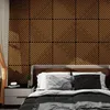 A bedroom scene with a bed and a wall covered in wood paneling. Podgląd zdjęcia produktu
