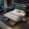 A modern bedroom with a bed, desk, and window.