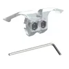 A clear product shot of a dental brace component and an Allen wrench on a white background. Produktbild-Vorschau