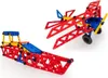Two construction toy models, an airplane and a ramp or track, made of red, blue, and yellow plastic pieces. Náhľad obrázku produktu