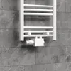 A white radiator valve set is mounted on a gray tiled wall. Náhľad obrázku produktu
