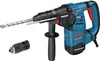 A Bosch hammer drill and an additional chuck are displayed against a white background. Náhled obrázku produktu