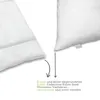 A close-up of a white pillow and a section of a white duvet, with arrows and text indicating a feature. Produktbild-Vorschau