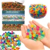 A collage of images showing colorful gel balls in various containers and being held in hands. Náhled obrázku produktu