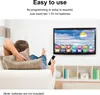 A person is relaxing on a couch, holding a remote control and looking at a TV screen. Náhled obrázku produktu