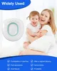 A woman is holding a baby, with a product displayed to the left and text overlays listing its uses. Produktbild-Vorschau