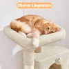 A cat is resting on a beige cat tree. Produktbild-Vorschau